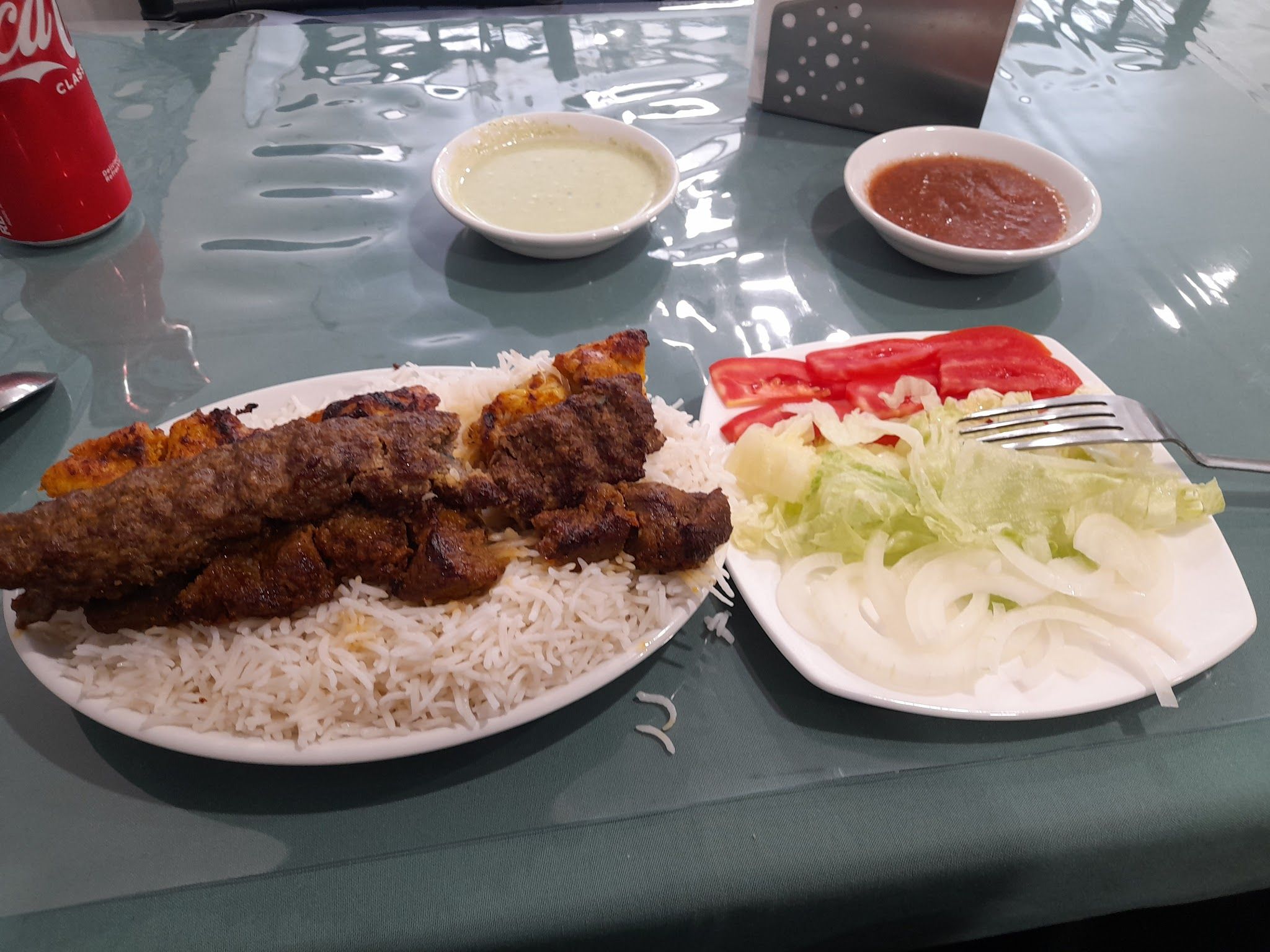 Mixed kebab plate with flame-grilled skewers at Nad's Afghan Kebab House